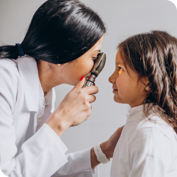 Optometrist checking eyes