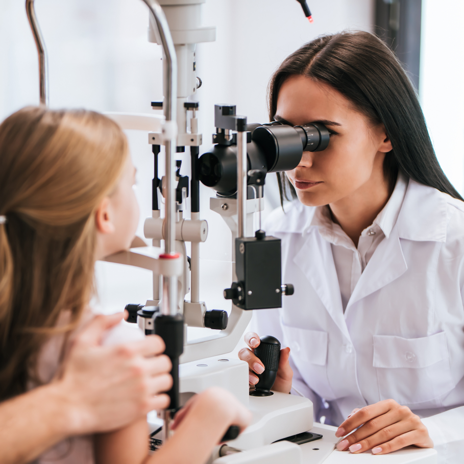 Optometrist checking eyes
