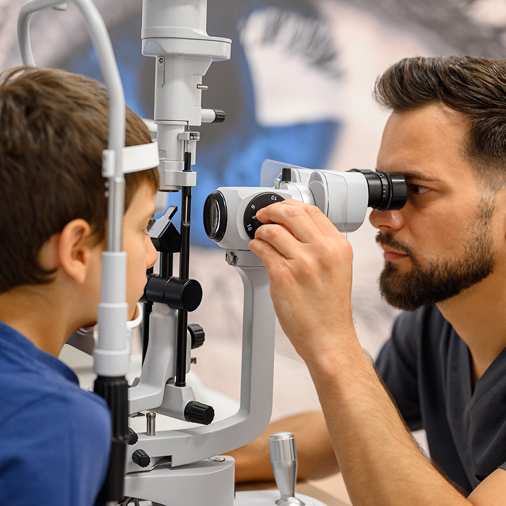 Optometrist checking eyes